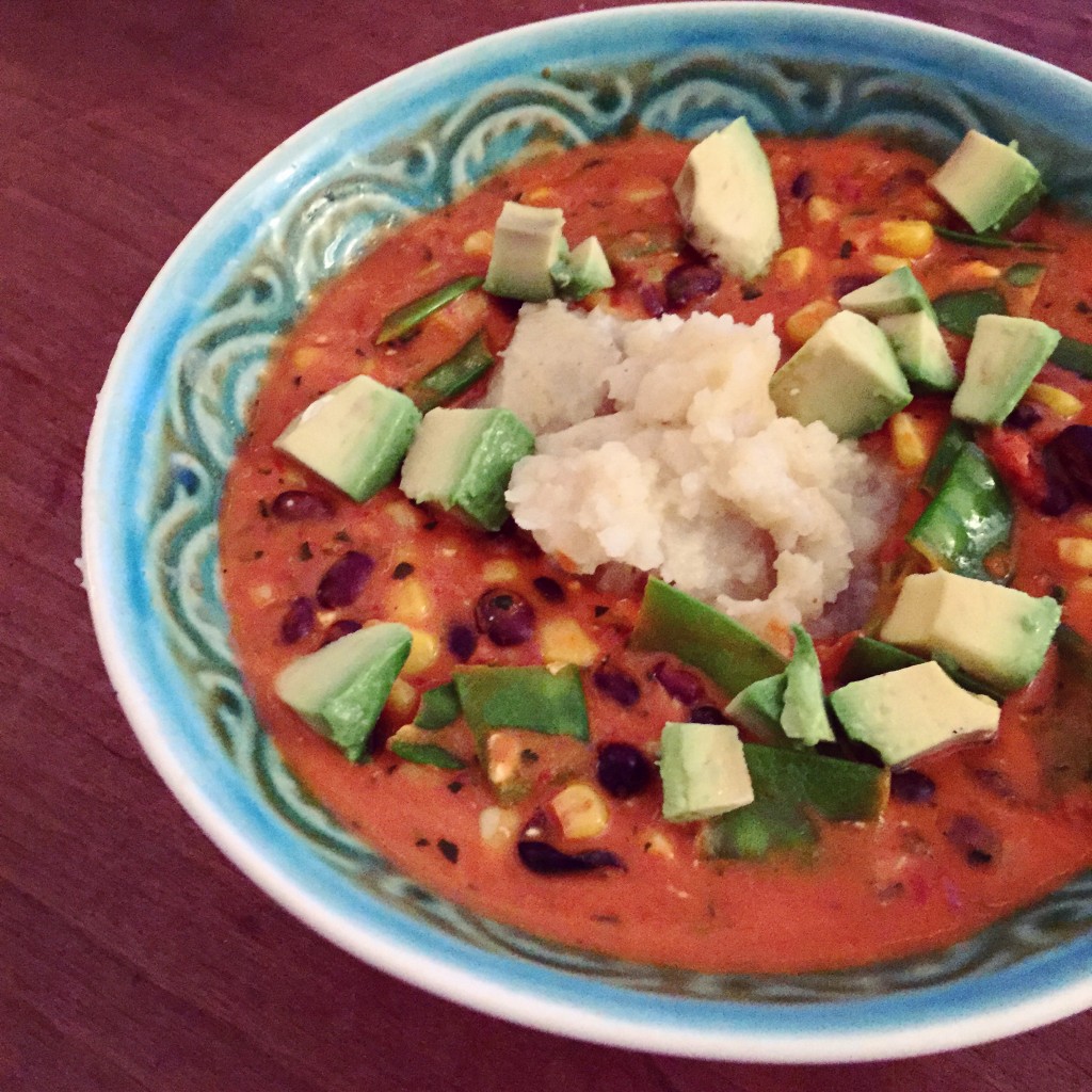 Mexican chili lime bean soup with fresh avocado and a garlic mashed potato island